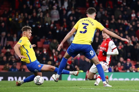 Charlie Patino of Arsenal (R) scores their fifth goal.