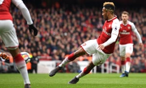 Pierre-Emerick Aubameyang volleys a shot into the corner for his and Arsenal’s second goal.