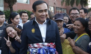 Thai prime minister Prayuth Chan-ocha, center, talks with supporters in Nakhon Ratchasima, Thailand.