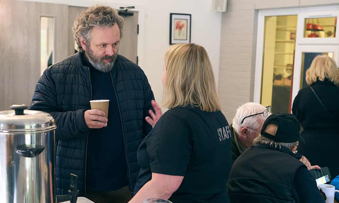 Michael Sheen talks with members of the community in Port Talbot for the Secret Million Pound Giveaway