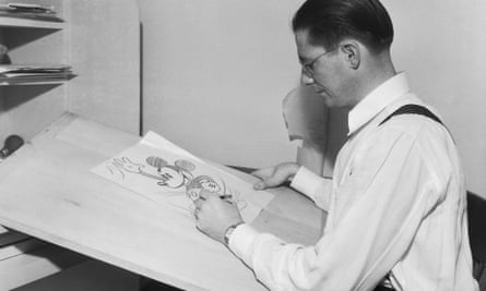 An animator draws Mickey Mouse at Disney Studios.