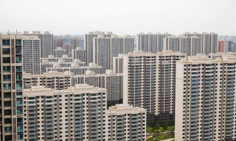 Apartment blocks in Beijing. Ratings agency S&amp;P thinks home sales could fall as much as 33% this year. 