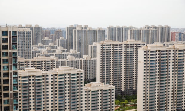 Apartment blocks in Beijing. Ratings agency S&P thinks home sales could fall as much as 33% this year.