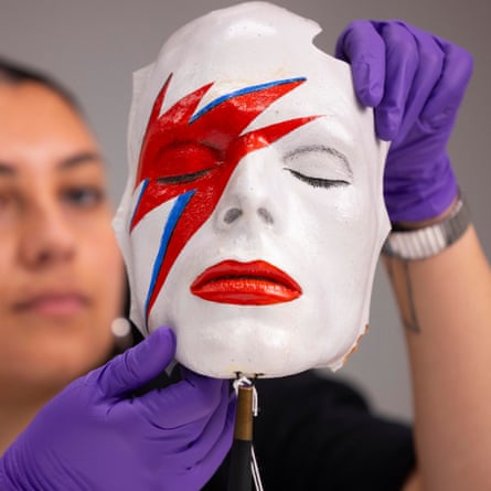 Clutches of sad remains … an Aladdin Sane life mask.