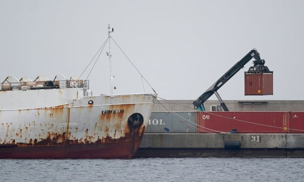 A crane moves a container next to livestock ship Karim Allah at Escombreras port in Cartagena, Spain, on 27 February. 