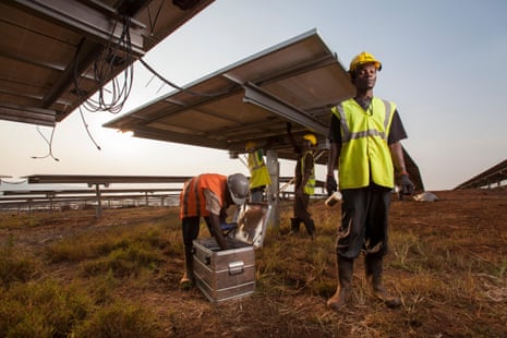Technicians installing panels in one of East Africa’s largest Solar farms in Rwanda