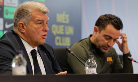 Joan Laporta (left) and Xavi announce the U-turn on 25 April