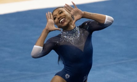 Nia Dennis competes on the floor during an NCAA gymnastics meet against Arizona State, a performance which went viral