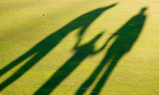 Shadows of parents and child