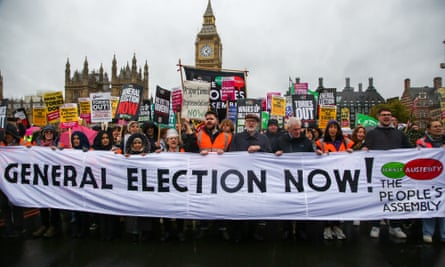 Thousands of protesters with placards take part in the People’s Assembly Against Austerity protest Britain is Broken in London.