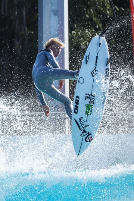 Vaughan gets air on a wave at UrbnSurf in Sydney