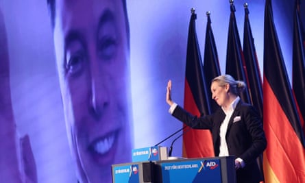 The far-right AfD’s Alice Weidel talks online to Elon Musk during her speech at an election campaign launch.