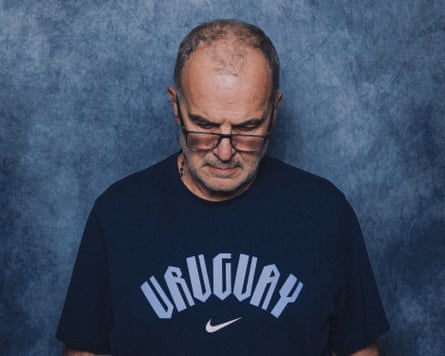 Marcelo Bielsa looks down during his official Fifa portrait photo