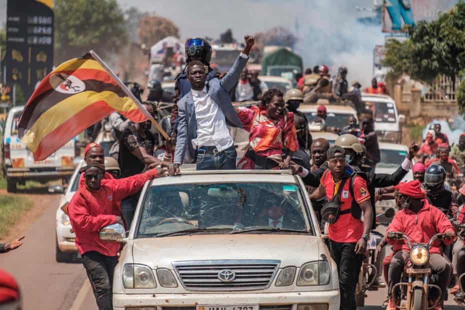 Bobi Wine greets supporters near Kayunga, Uganda, 1 December