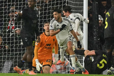 Raúl Jiménez races away in delight after his late goal for Fulham