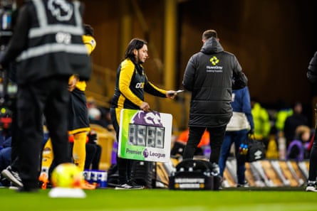 Ruiz with the substitution board on the sidelines