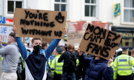 Chelsea fans protest the original ESL plans outside Stamford Bridge in April 2021.