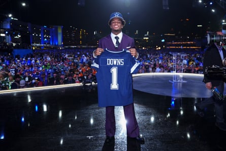 Caleb Downs poses after being selected by the Dallas Cowboys on Thursday night.