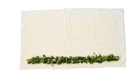 Felicity Cloake’s borek 05b. spoon a line of the filling down one of the long sides (or, if it’s a half moon, down the flat edge), leaving a small border around the edges.