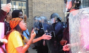 Protesters confront police during demonstrations in St Louis, Missouri following the acquittal of a white former St. Louis police officer, who was charged with first-degree murder in the shooting death of black motorist Anthony Lamar Smith in 2011.