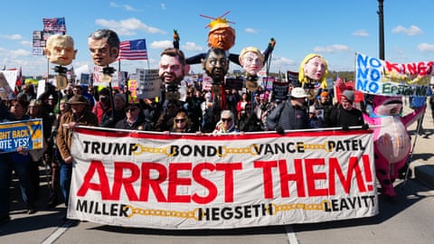 Protesters astatine nan No Kings objection successful Washington DC demanding nan arrests of Trump management officials