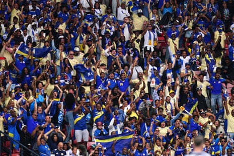 The Curaçao fans are happy, unlike their hosts