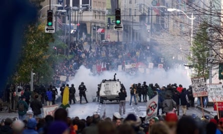 Seattle police use gas to push back World Trade Organization protesters in downtown Seattle on 30 November 1999.