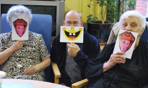 Rob Gee runs a laughter session with elderly people in Leicester.