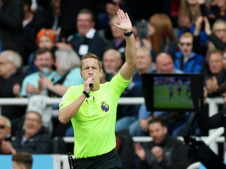 Match referee John Brooks