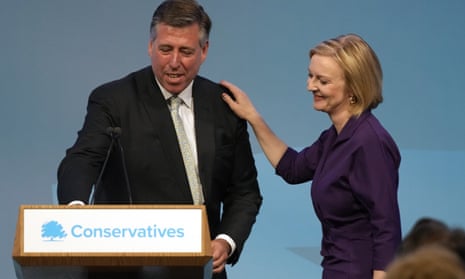 Graham Brady, chair of the 1922 Committee, congratulates Liz Truss after her party leadership victory on 5 September.