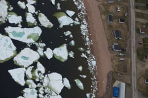 Buildings in L’Anse-au-Loup look out over the pack ice flow.