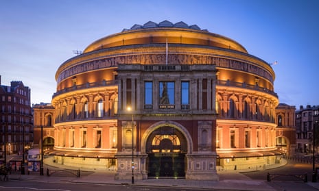 Royal Albert Hall, London, at dusk, and illuminated. UK.