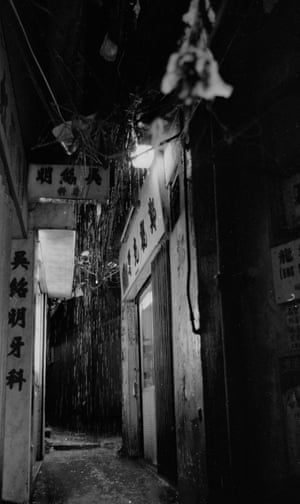 Keeping Lee, âWet Alley in Kowloon Walled Cityâ, Hong Kong 1987The text for the captions is all sourced from the book:City of Darkness, published by Watermark UK 2018, photographs by Greg Girard and Ian Lambot 27x27cm, 356 pages, hard cover, english, ISBN 978-1-873200-88-9(all caption info is sourced from the above book) âLink to the book: https://bluelotus-gallery.com/shop/book-city-of-darkness