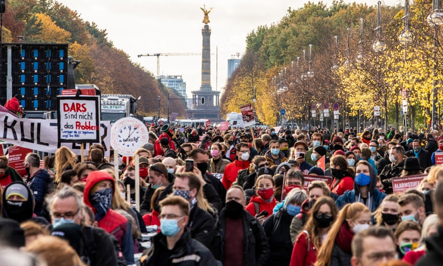 Protesters gather at Brandenburg Gate in Berlin