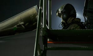 A photo made available by the British Ministry of Defence (MoD) showing a British Royal Air Force (RAF) Tornado pilot in the cockpit of his aircraft at RAF Akrotiri, Cyprus