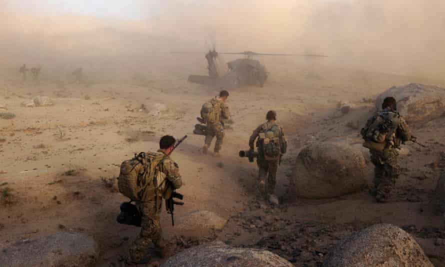 Morning mail: lockdown extension looms, ABC rejected Porter offer, Afghanistan 20 years on 2 Special Operations Task Group soldiers make their way to a UH-60 Blackhawk helicopter in Sha Wali Kot