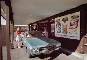 The driver of an HQ Premier at the new ‘drive-thru bottle-o’ at the High Flyer hotel in Condell Park, 1975