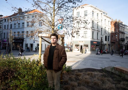 Benjamin Van Bunderen Robberechts, who tried to save Rosa Reichel’s life when she was swept away by flooding, at her memorial tree in Brussels
