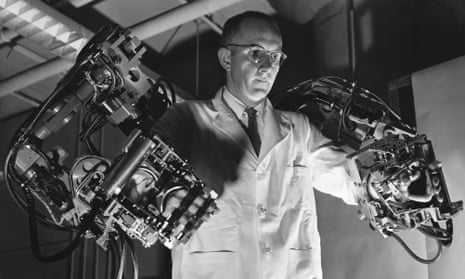 General Electric  engineer Ralph Mosher using a robotic exoskeleton he developed in the 1950s.