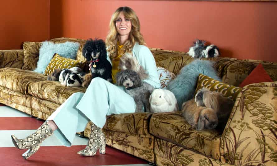 Whinnie’s ark: Whinnie Williams at home with a few of her furry companions. The vintage sofa seats eight.