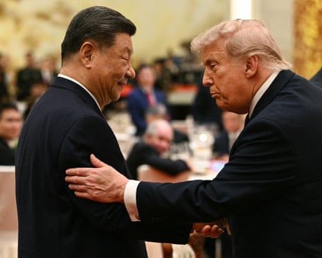 Xi and Trump greet each other with handshakes and arm touches at a state banquet
