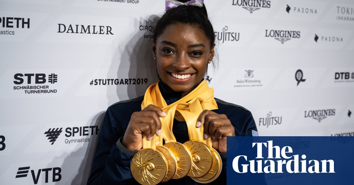 Simone Biles wins two more golds and sets world championship medal record