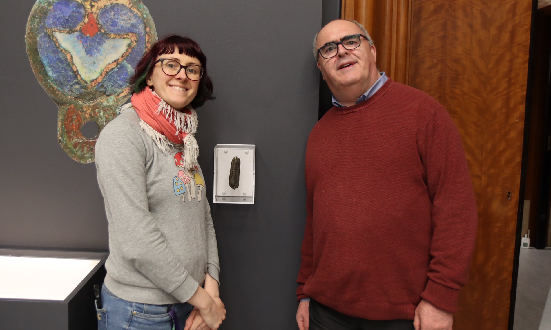 Graham Senior, the discoverer of the stone, stands with Ali Wells, curator of the exhibition at the Herbert Art Gallery and Museum in Coventry. Photograph: The Herbert Art Gallery and Museum.