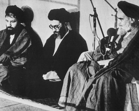 Ayatollah Khomeini (right) invests Ali Khamenei (centre) as the third president of the Islamic republic in October 1981