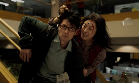 Harry Shum Jr and Michelle Yeoh in Everything Everywhere All At Once, a film inspiring a frenzy of breathless praise.