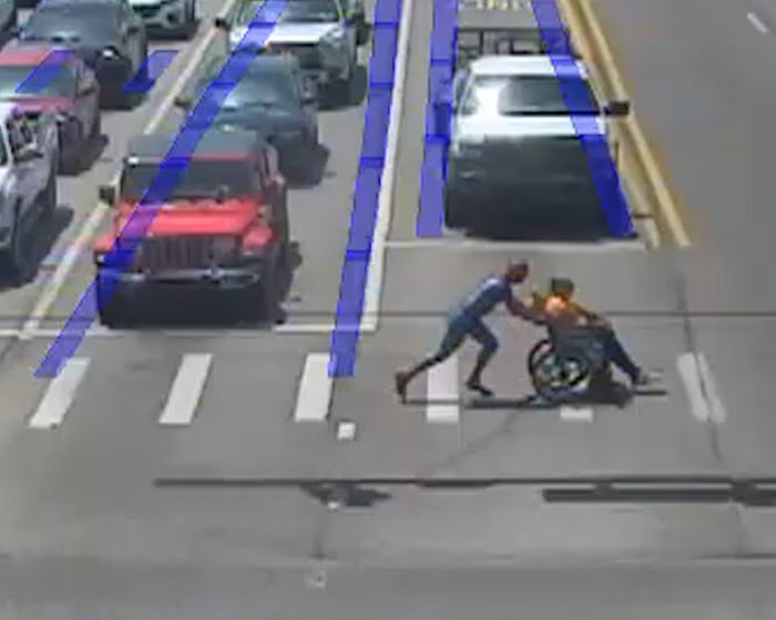 Hero in Spandex: Spider-Man Rescues Wheelchair User from Busy Road
