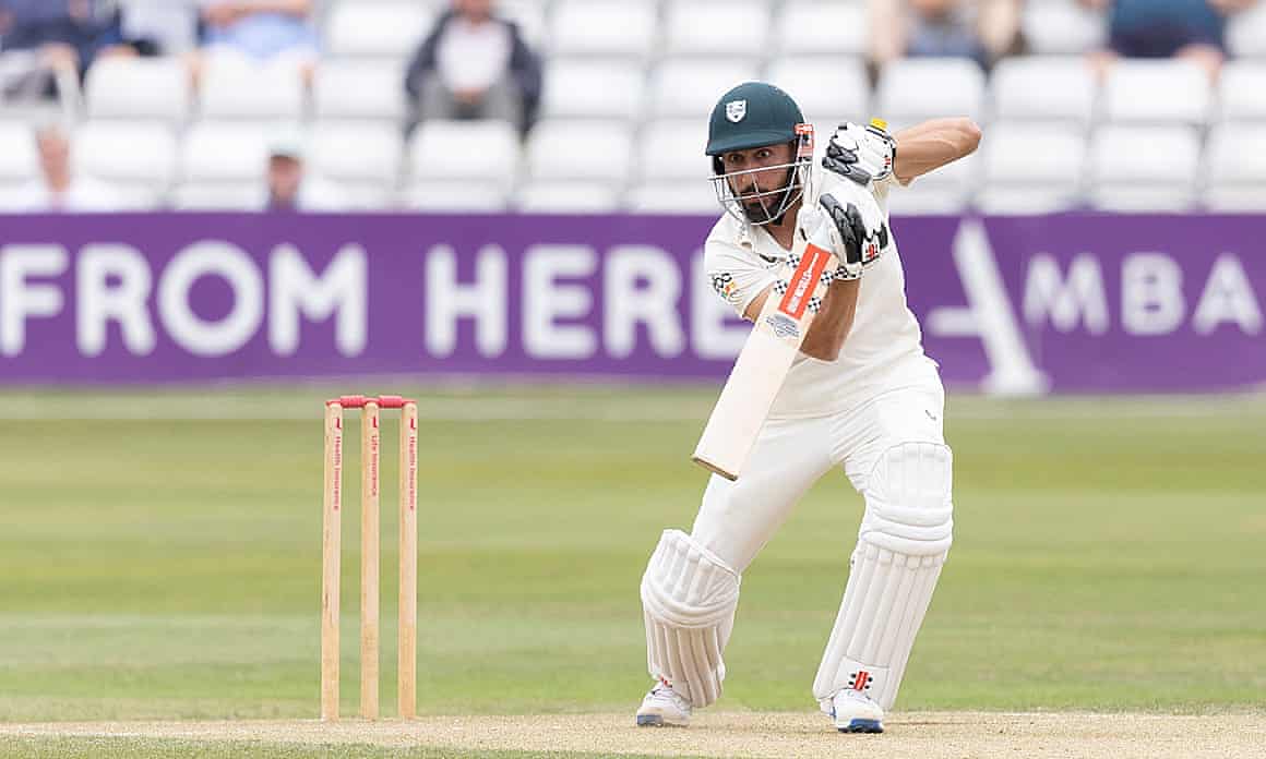 Kashif Ali of Worcestershire drives into the covers during their match against Essex