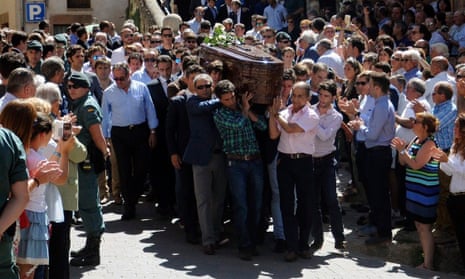 Relatives carry Víctor Barrio’s coffin during his funeral in Sepulveda, Spain, on Monday.