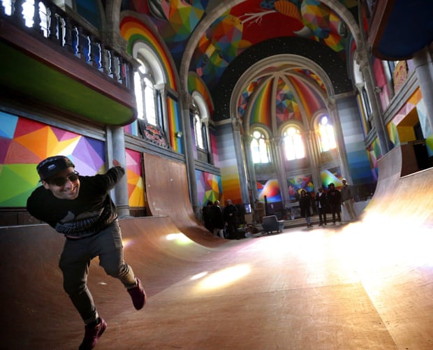 Spanish artist Okuda San Miguel poses for a picture in a former Civil War’s arsenal installed at the demystified Santa Barbara church in Oviedo, Asturias, Spain.