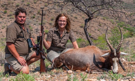 Hunters pose with their animal trophy on a game farm in Namibia.